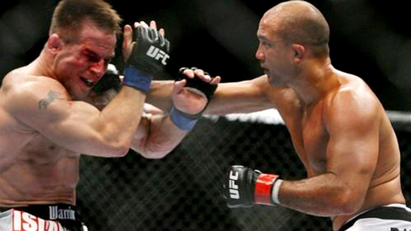 B.J. Penn lands a shot to Sean Sherk in the second round during their lightweight title fight at UFC 84 in Las Vegas.