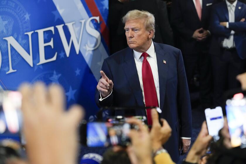 Republican presidential nominee former President Donald Trump speaks to reporters in the spin room after a presidential debate between Republican presidential nominee former President Donald Trump and Democratic presidential nominee Vice President Kamala Harris, Tuesday, Sept. 10, 2024, in Philadelphia. (AP Photo/Matt Rourke)