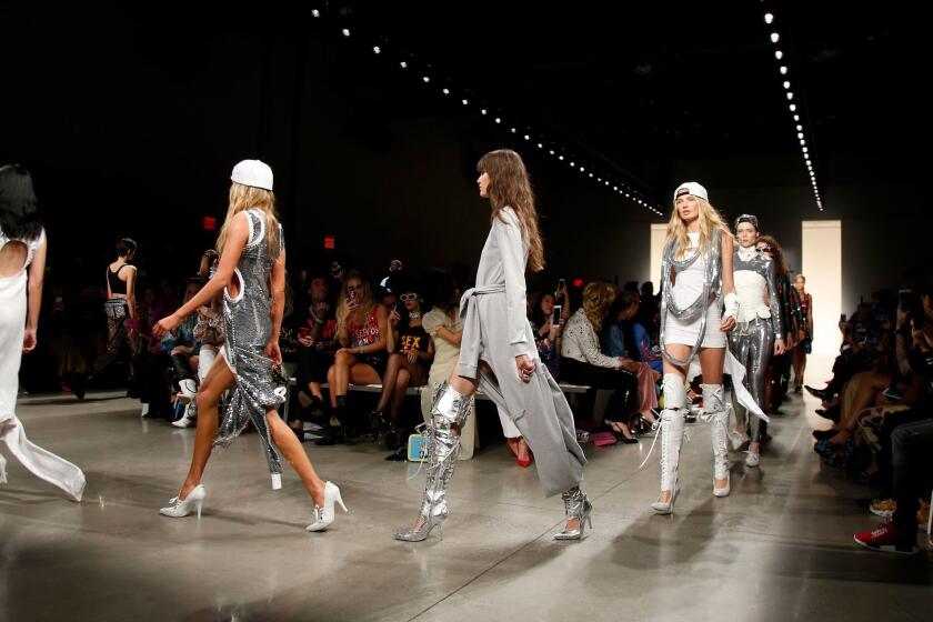 The Jeremy Scott spring 2018 collection is modeled during Fashion Week, Friday, Sept. 8, 2017, in New York. (AP Photo/Jason DeCrow)