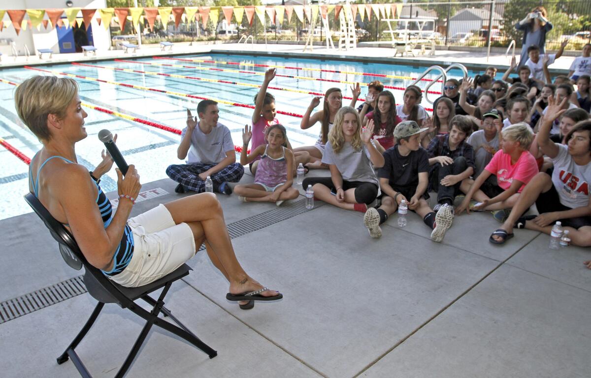 Twelve-time Olympic medalist Dara Torres spoke to kids about preventing meningitis at Verdugo Pool in Burbank on Tuesday, May 13, 2014.