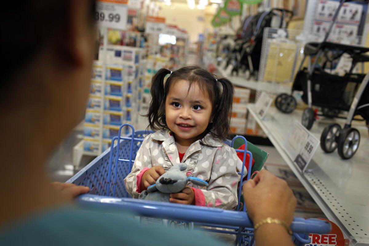 A young shopper in a Los Angeles toy store. Consumer advocates warn of continuing dangers in the toy market but concede that new regulations are making items safer.
