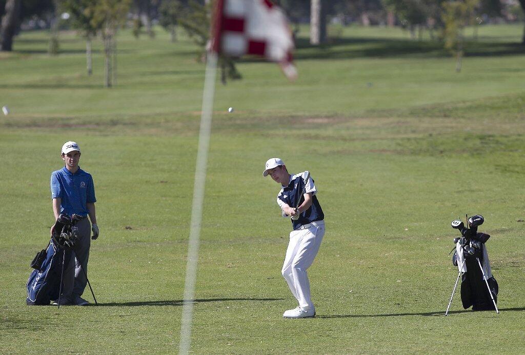 Newport Harbor High's Campbell Norris hits to the green on hole No. 4 at Costa Mesa Country Club's Mesa Linda course on Wednesday.
