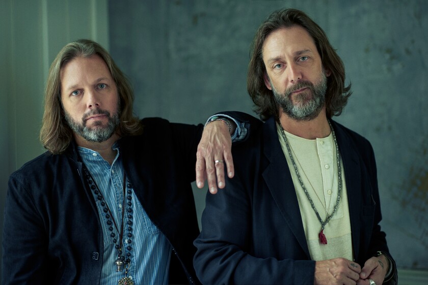 Brothers Rich Robinson, left, and Chris Robinson of the Black Crowes.