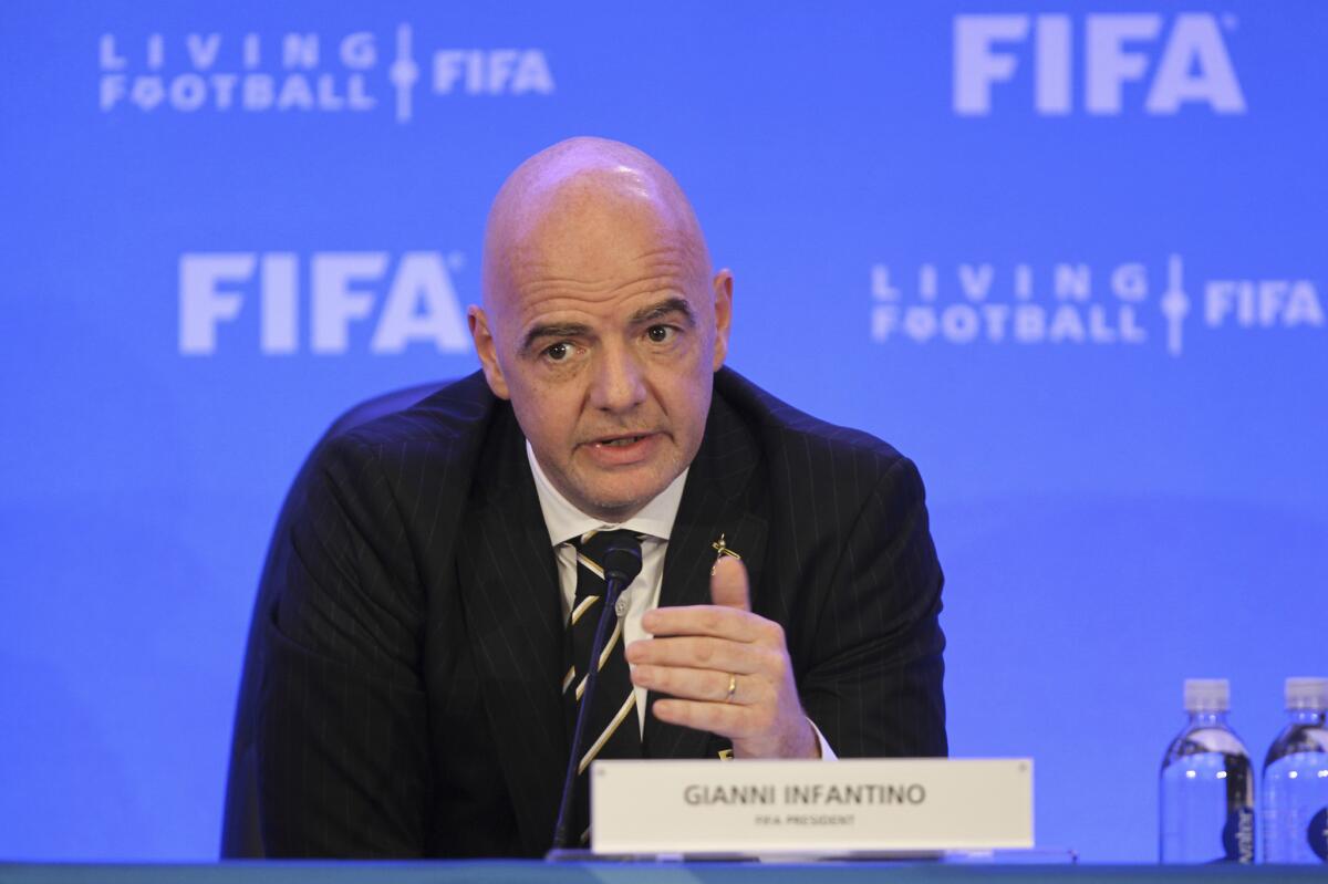 FIFA President Gianni Infantino talks during a press conference after a FIFA Council Meeting, Friday, March 15, 2019, in Miami. The council approved working with Qatar to explore expanding the 2022 World Cup to 48 teams by adding at least one more country in the Persian Gulf to host matches.