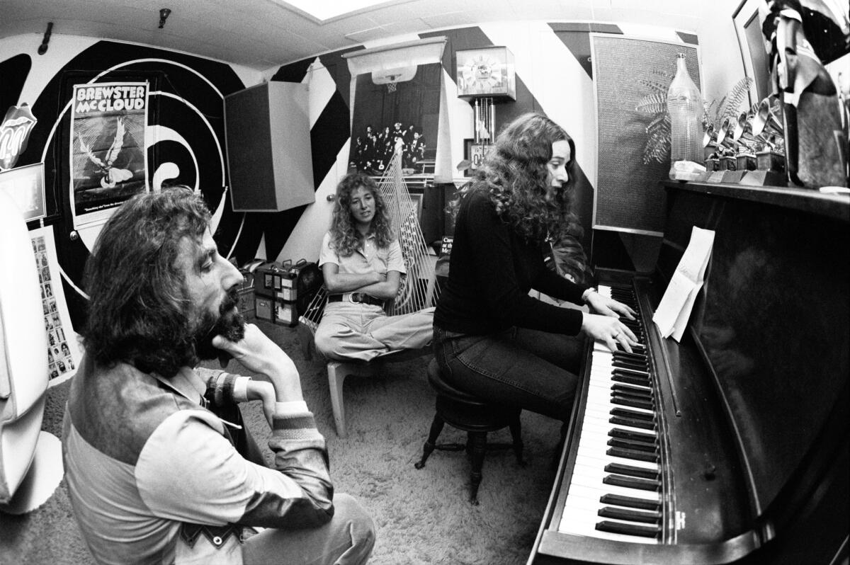 Lou Adler, left, Toni Stern and Carole King, in Adler's L.A. office, March 1971. 