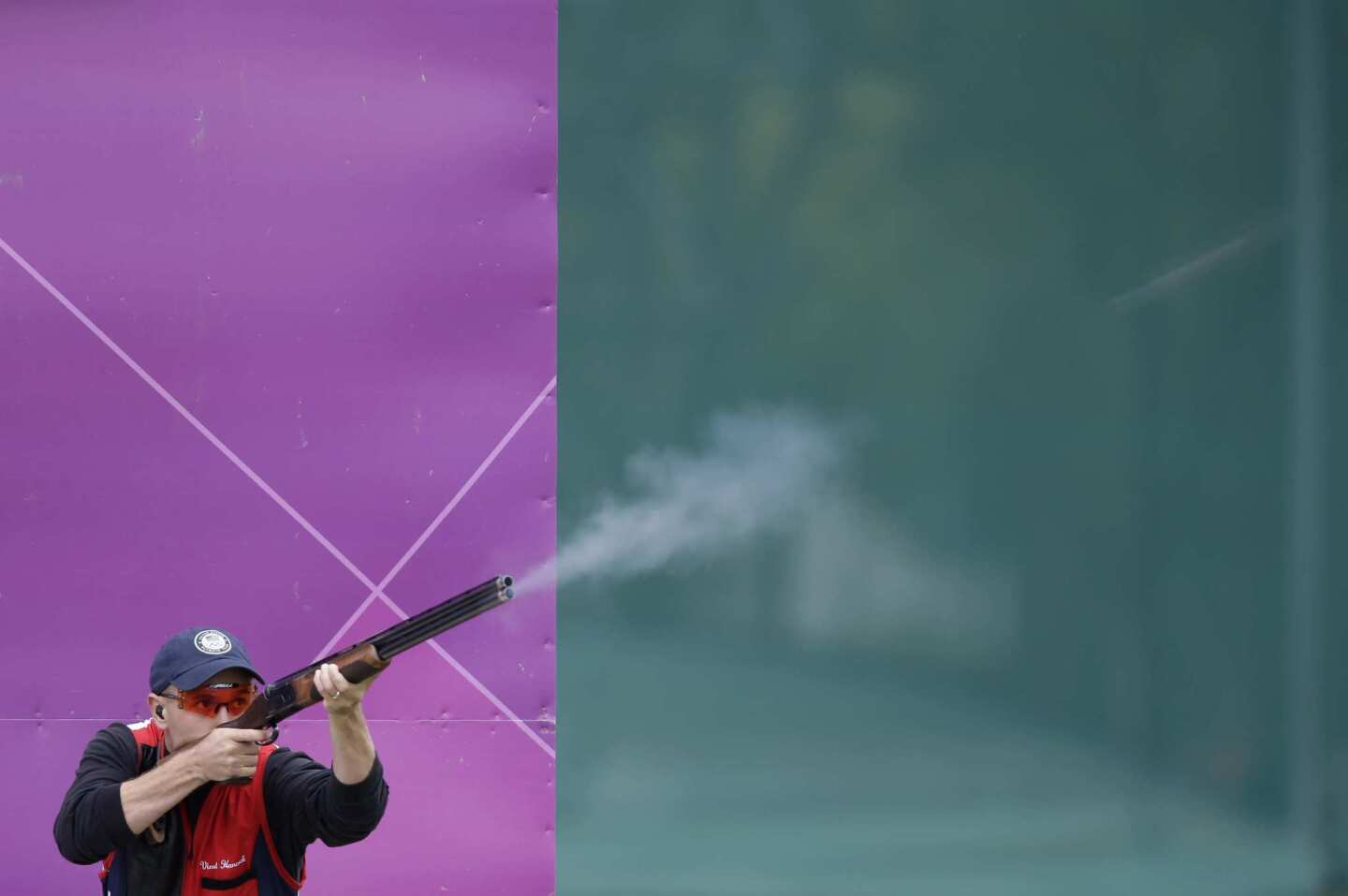 Vincent Hancock of the U.S. shoots during the men's skeet event. Hancock won a gold medal for the second straight Olympics. Hancock, a sergeant in the U.S. Army, is a member of the Army¿s Marksmanship Unit.