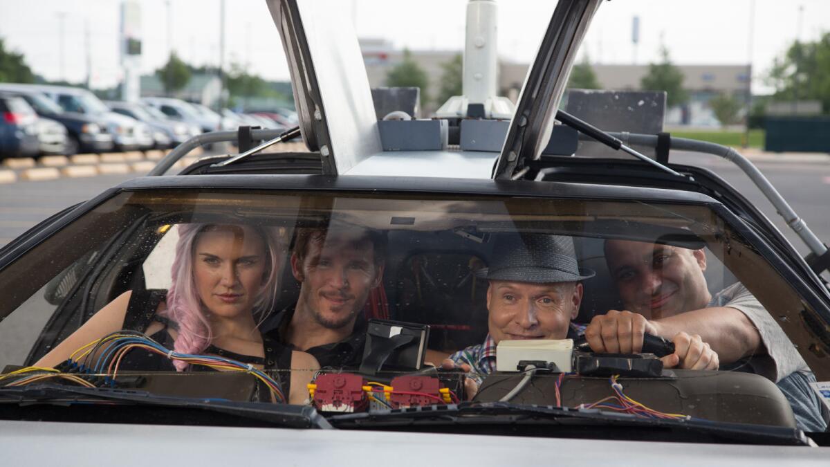 Maggie Grace, left, Ryan Kwanten, Brooks Braselman and Russell Peters in the movie "Supercon."