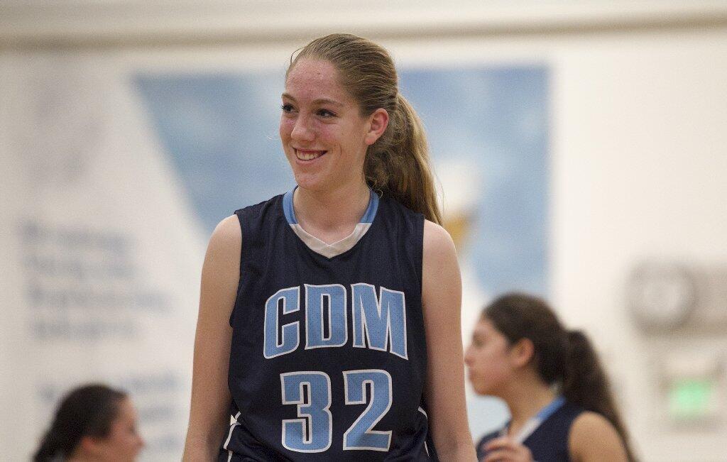 Corona del Mar High's Natalia Bruening smiles after drawing a foul during a game against Newport Harbor on Tuesday.