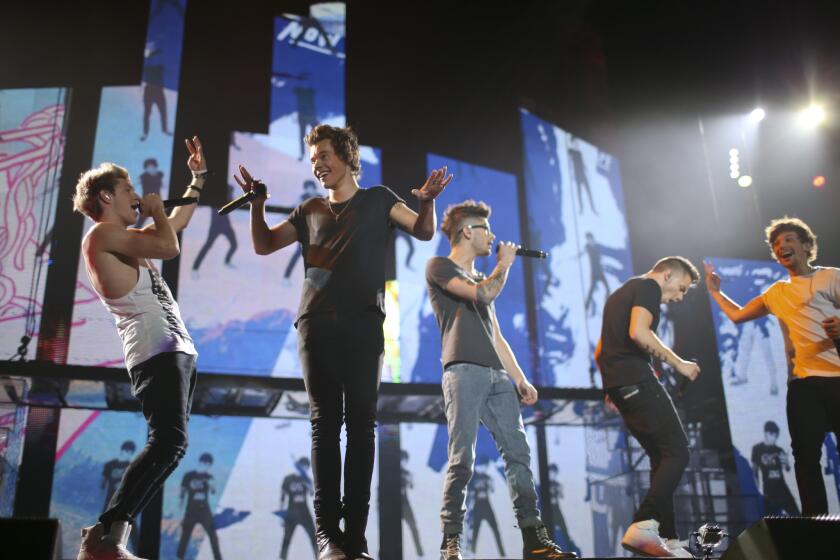 One Direction, shown performing last week in Minneapolis, has set a new record for one-day viewership with its new video for "Best Song Ever."