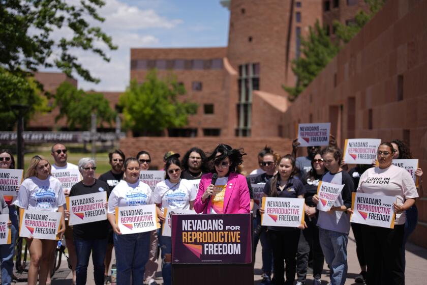 Lindsey Harmon, President, Nevadans for Reproductive Freedom, speaks during a news conference by Nevadans for Reproductive Freedom, Monday, May 20, 2024, in Las Vegas. Abortion access advocates in Nevada said Monday they've submitted twice the number of petition signatures needed to qualify for a ballot measure aimed at enshrining what they term reproductive rights in the state constitution. (AP Photo/John Locher)