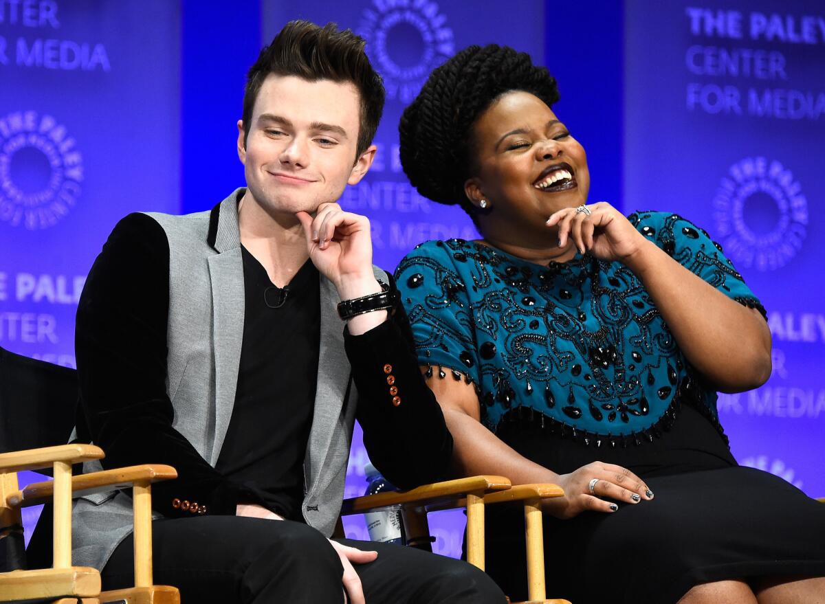 Actors Chris Colfer and Amber Riley on stage at The Paley Center For Media.