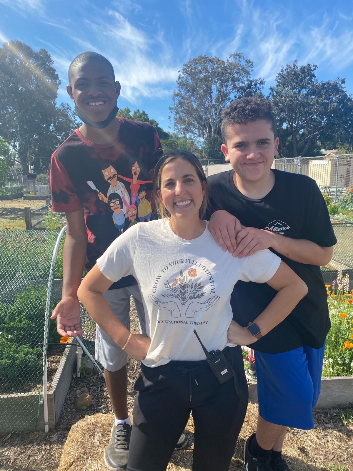 Jessica Leiser and two students at the San Carlos Community Garden.