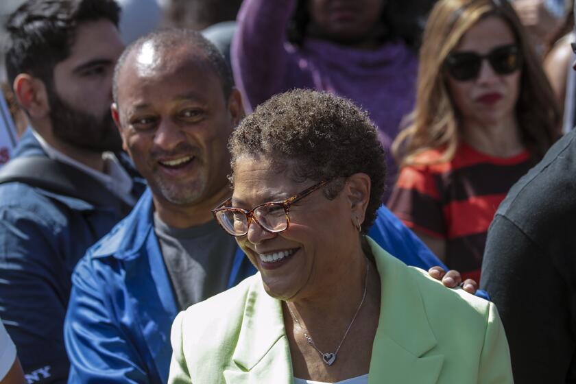 Los Angeles, CA - April 30: Congresswoman Karen Bass, who is running for LA Mayor, among her supporters and volunteers at the opening of her campaign headquarters on 3601 La Brea Avenue on Saturday, April 30, 2022 in Los Angeles, CA. (Irfan Khan / Los Angeles Times)