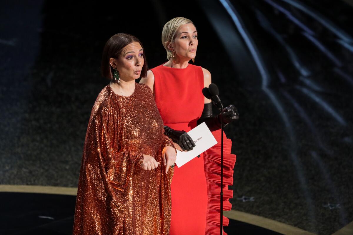 Maya Rudolph, left, and Kristen Wiig showed off their acting chops while presenting at the 92nd Academy Awards.