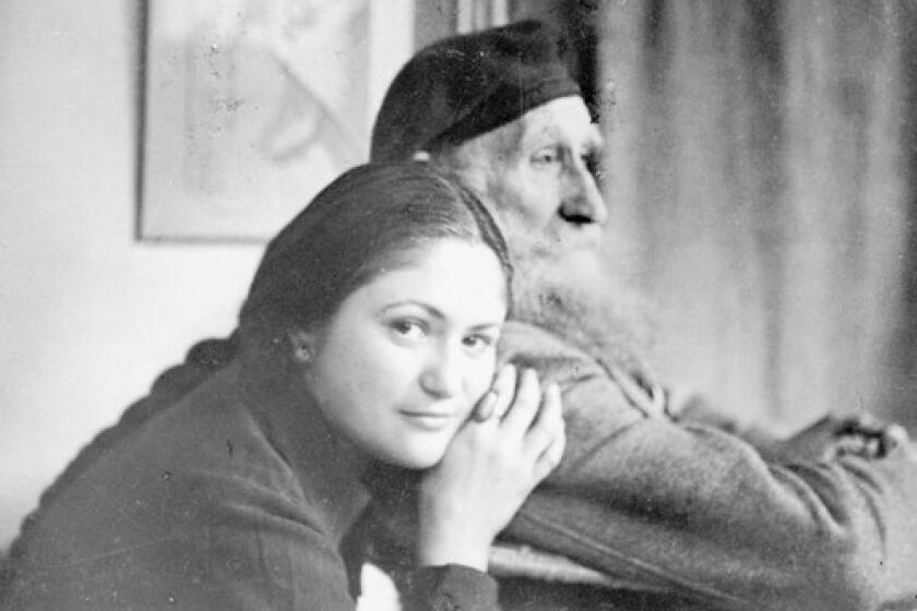 Dina Vierny, seen in 1944 with French sculptor Aristide Maillol, began modeling for him at age 15. She was his greatest devotee and the leading force in making his acclaimed figurative bronzes available to the public.