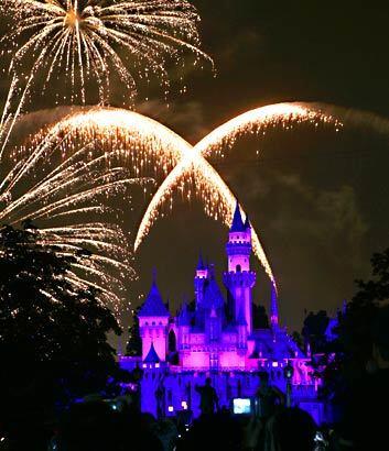 The fireworks show goes off over Sleeping Beauty's castle and Main Street at Disneyland.