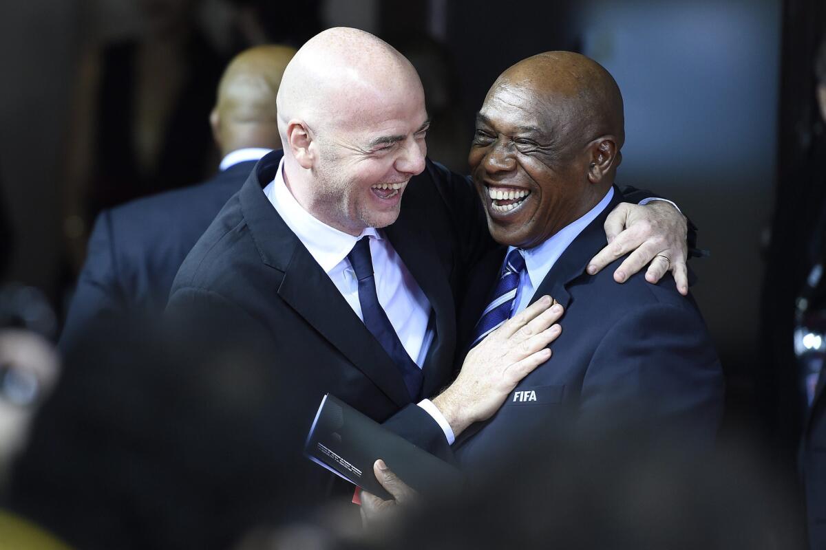 Tokyo Sexwale, at right, with Gianni Infantino