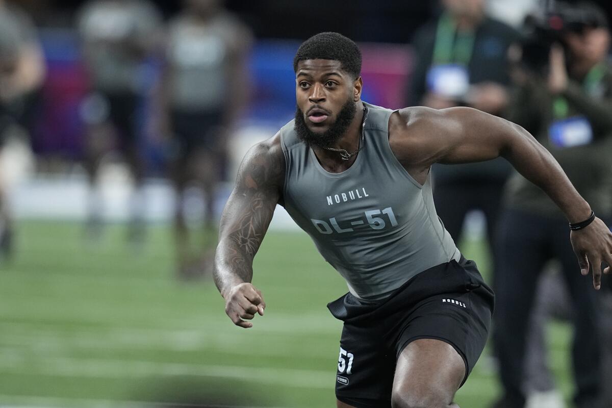 Florida State defensive lineman Jared Verse runs a drill at the NFL Scouting Combine.