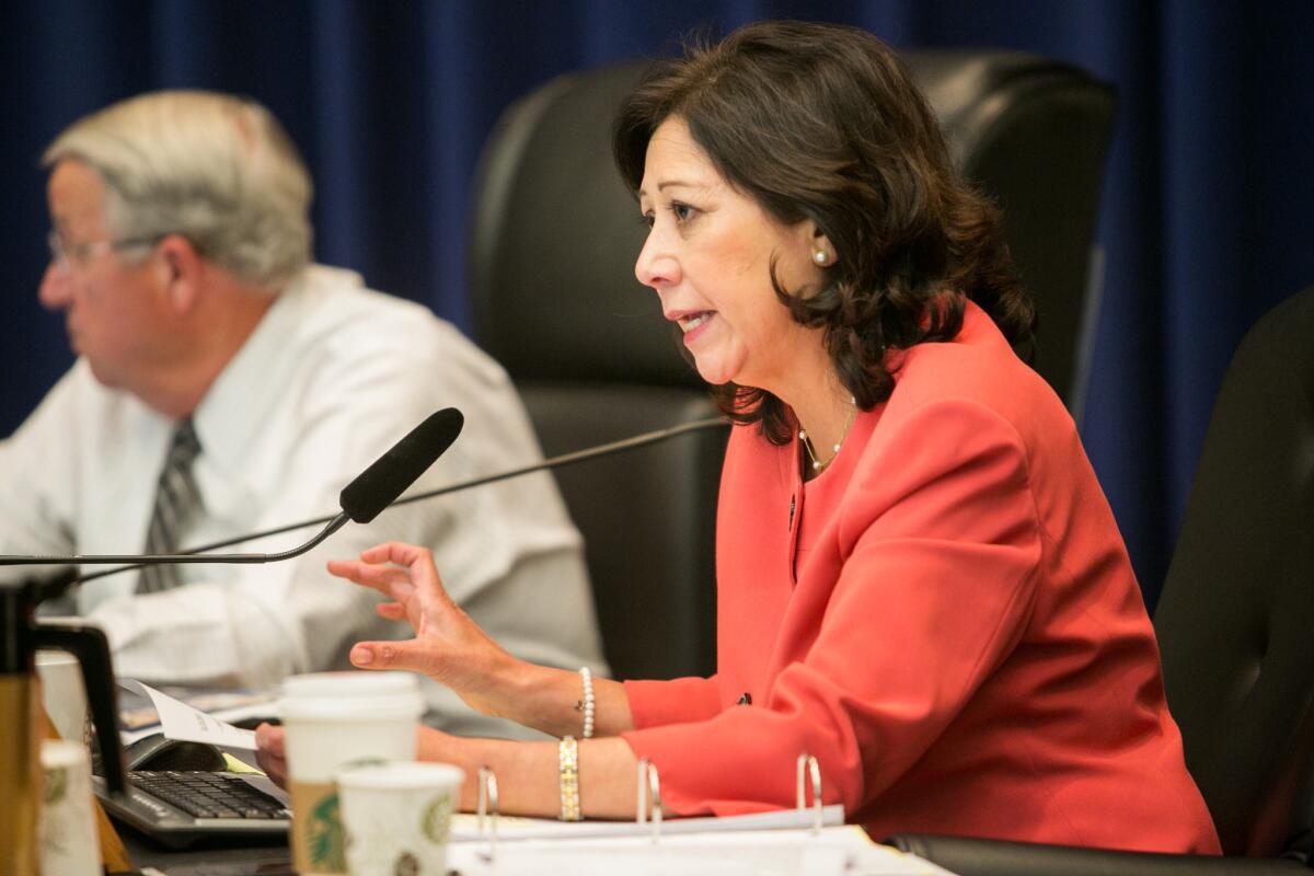 Los Angeles County Supervisor Hilda L. Solis speaks during a Board of Supervisors session to discuss a minimum wage hike proposal.