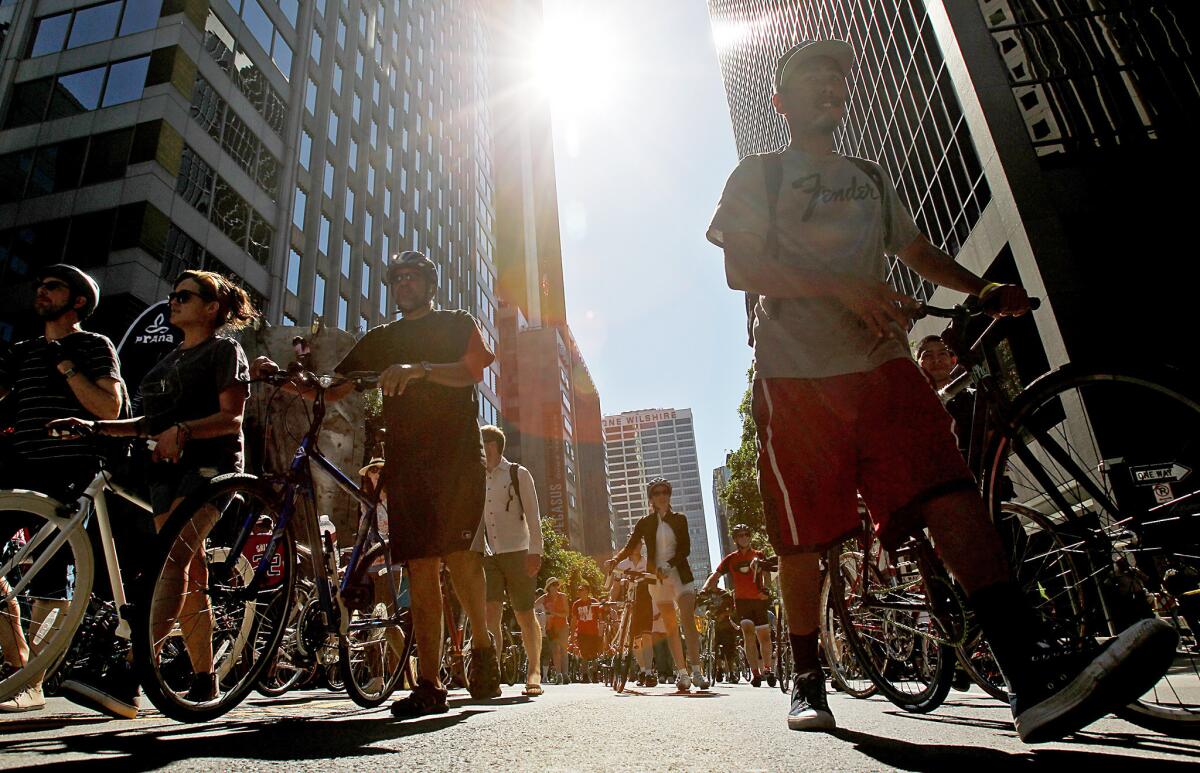 Thousands of bicyclists converge on Wilshire Boulevard in Los Angeles as they participate in the annual CicLAvia bike festival on Sunday, April 6, 2014.