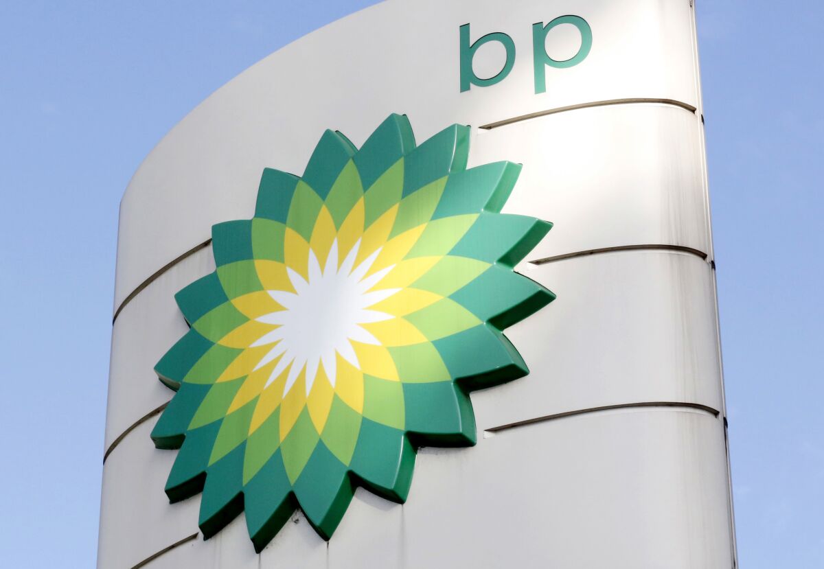 FILE - A view of the BP logo at a petrol station in London, Tuesday, Aug. 1, 2017. BP PLC reported its biggest full-year profit for eight years on Tuesday, Feb. 8, 2022 its coffers boosted by soaring oil and gas prices that have hiked domestic fuel bills for millions of people. (AP Photo/Caroline Spiezio, File)