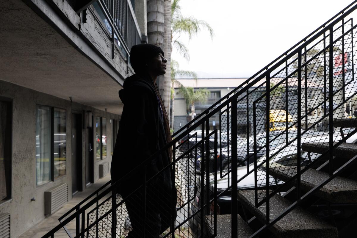 A woman walks upstairs.