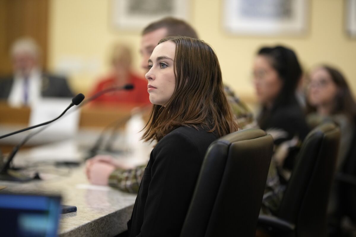 Riley Judd, a student at the University of Denver and a legislative intern, gives testimony during a Colorado Senate hearing on measures to address eating disorders Thursday, March 23, 2023, in the State Capitol in Denver. Lawmakers in states including Colorado, California, Texas and New York are taking big legislative swings at the eating disorder crisis that is bedeviling America's populous. (AP Photo/David Zalubowski)