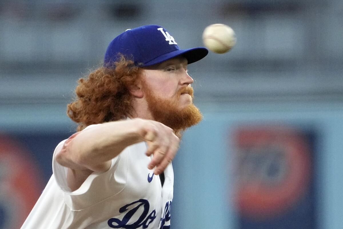 Dodgers starting pitcher Dustin May delivers during the first inning.
