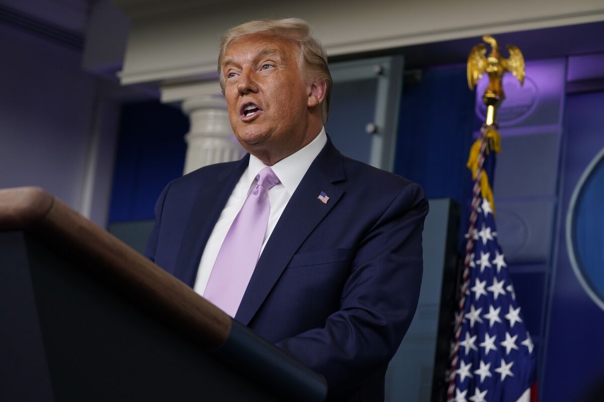President Trump speaks during a news conference at the White House.
