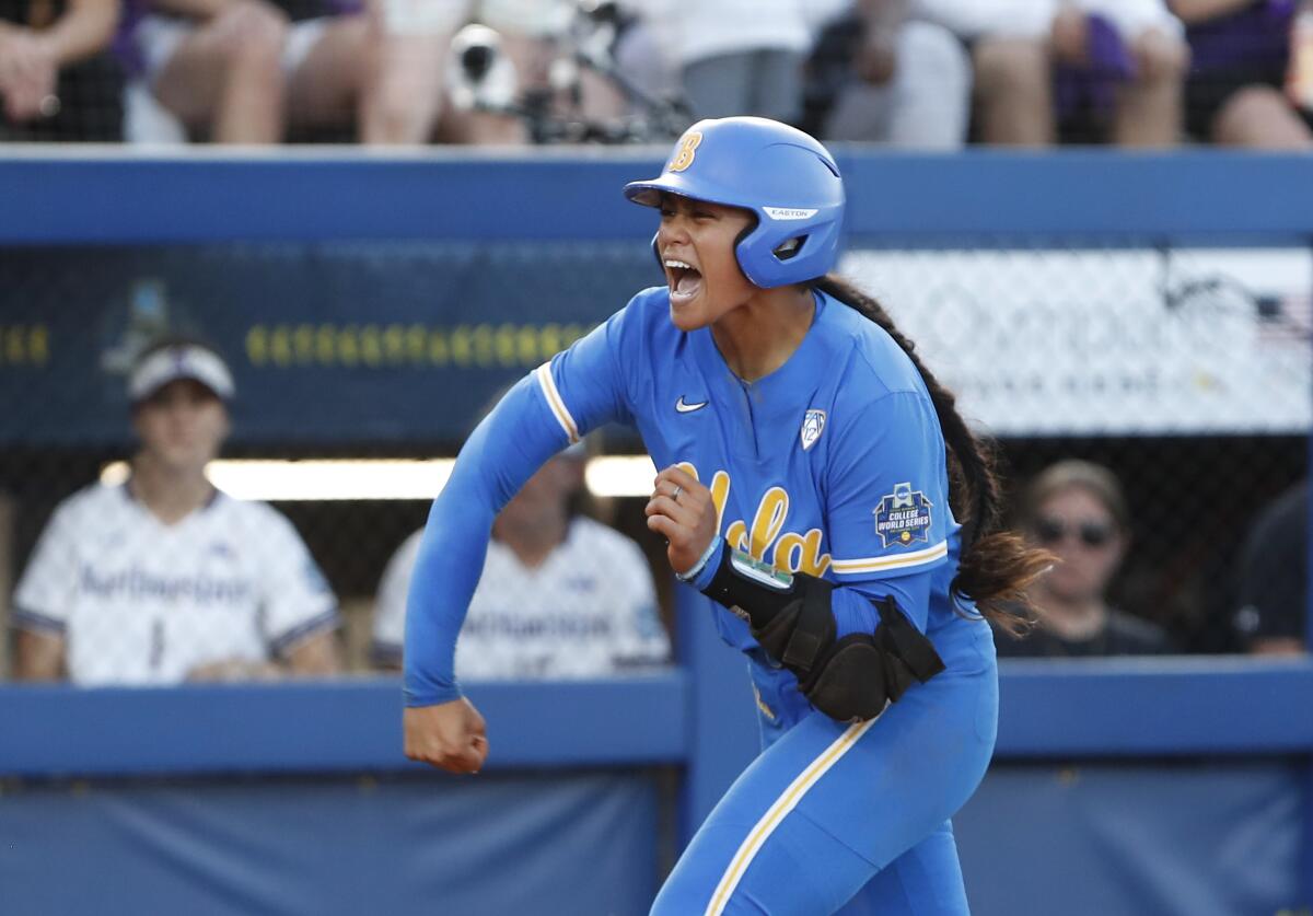UCLA's Megan Faraimo celebrates her sixth-inning home run against Northwestern on June 3, 2022.