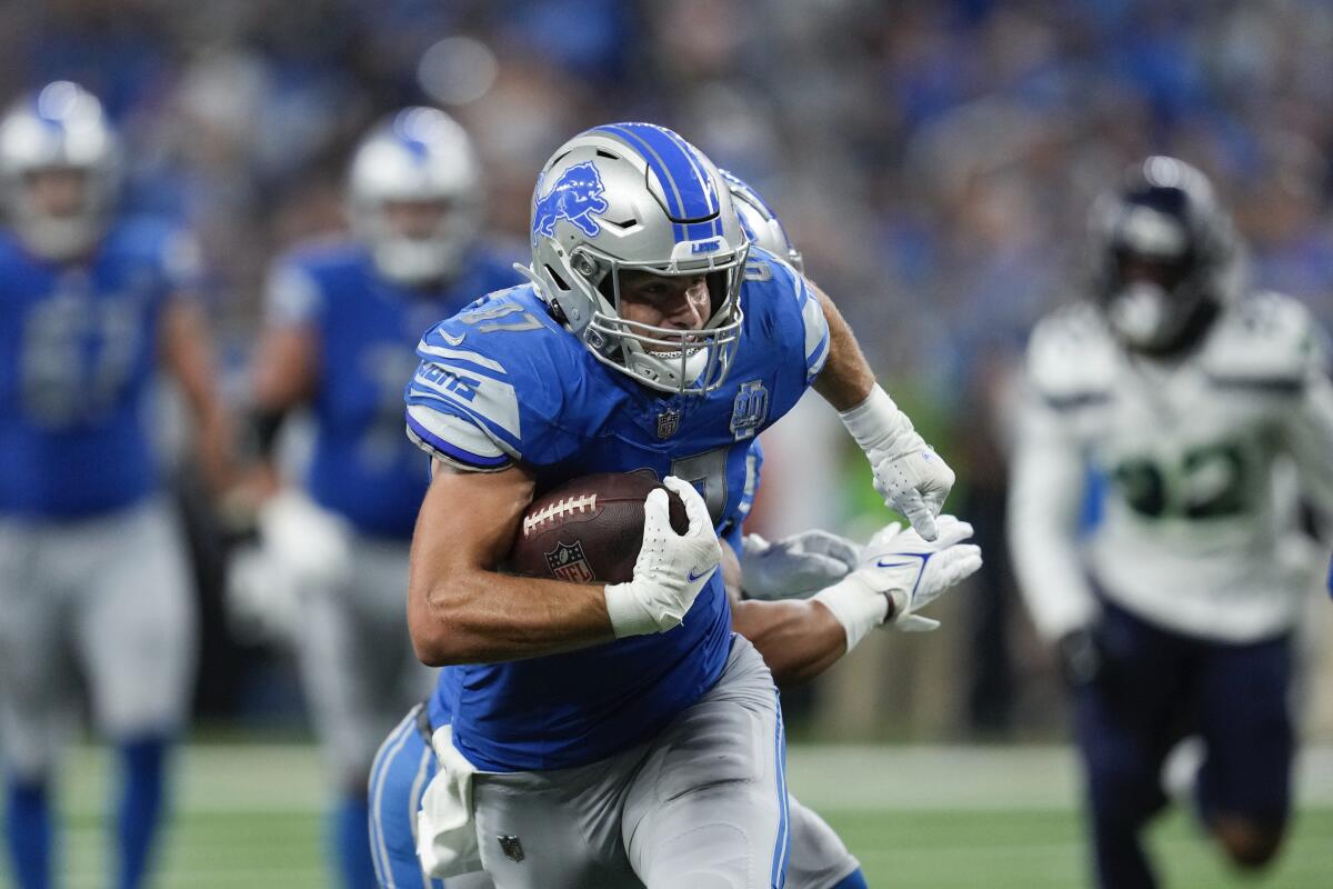 Detroit Lions tight end Sam LaPorta runs after a catch against the Seattle Seahawks.