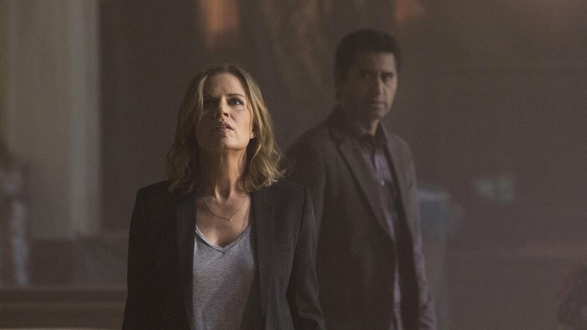 Kim Dickens and Cliff Curtis in the new "Walking Dead" spin-off "Fear the Walking Dead" on AMC.
