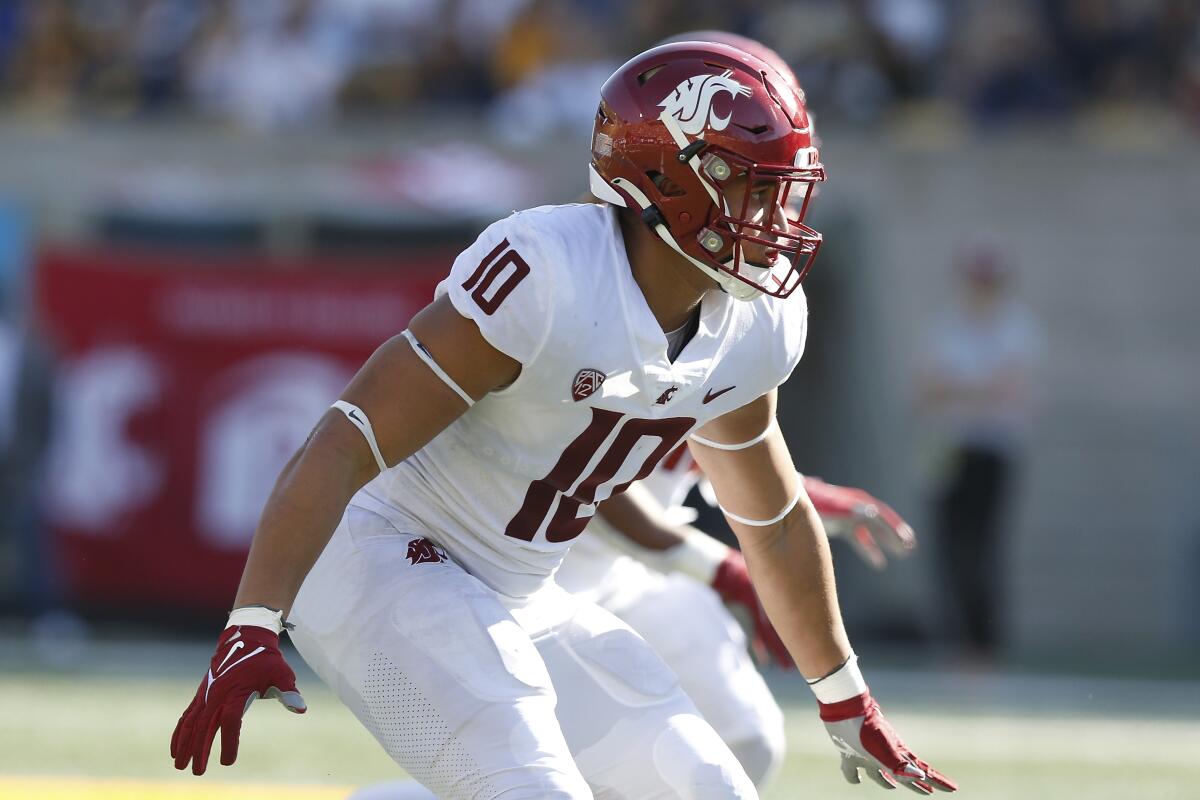 FILE - Washington State Cougars defensive end Ron Stone Jr. (10) defends against the California Golden Bears during an NCAA football game on Oct. 2, 2021 in Berkeley, Calif. (AP Photo/Lachlan Cunningham, File)