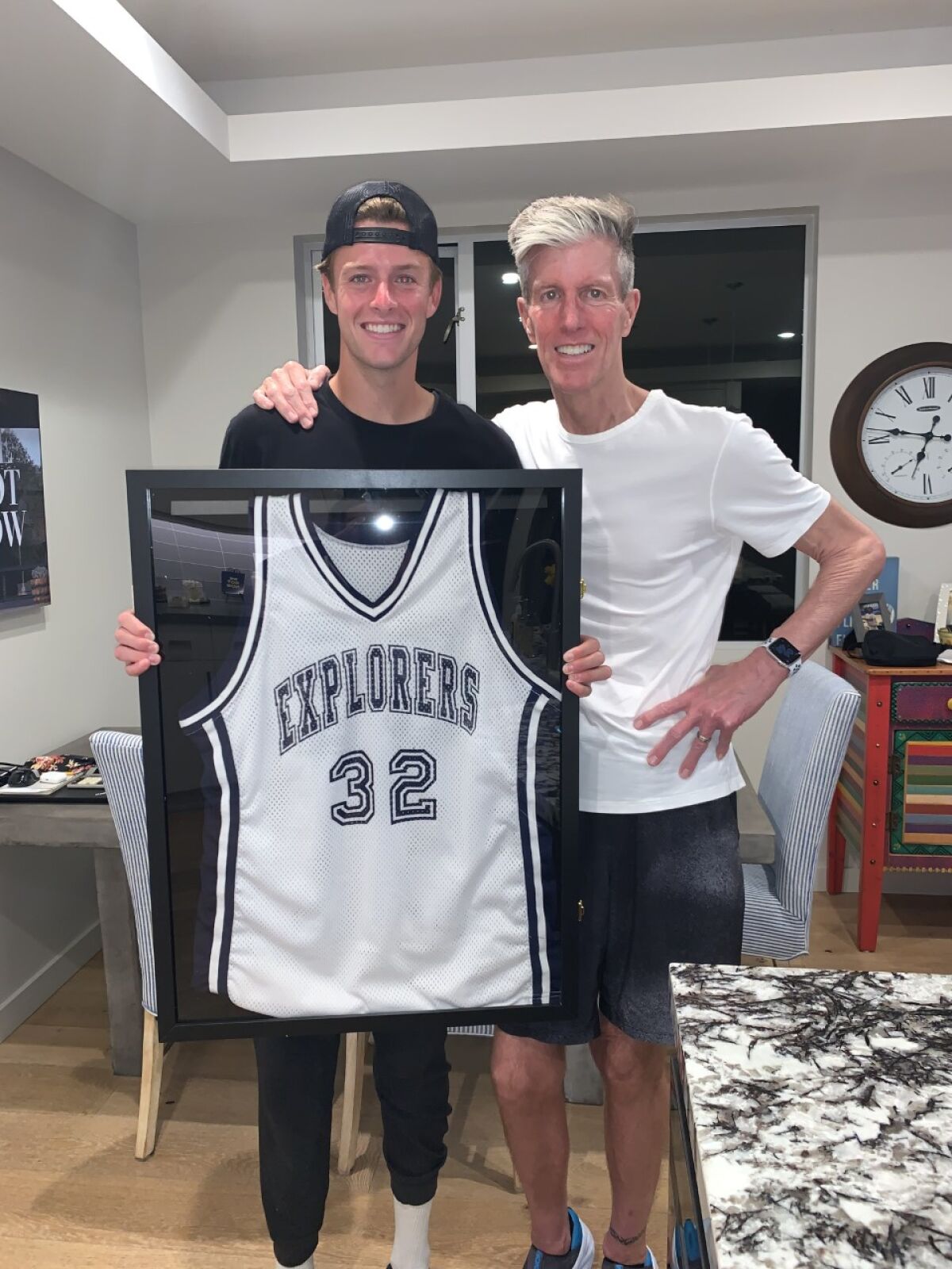 Jackson Strong (left) ran 32 miles in an ALS fundraiser to honor his father, John Strong