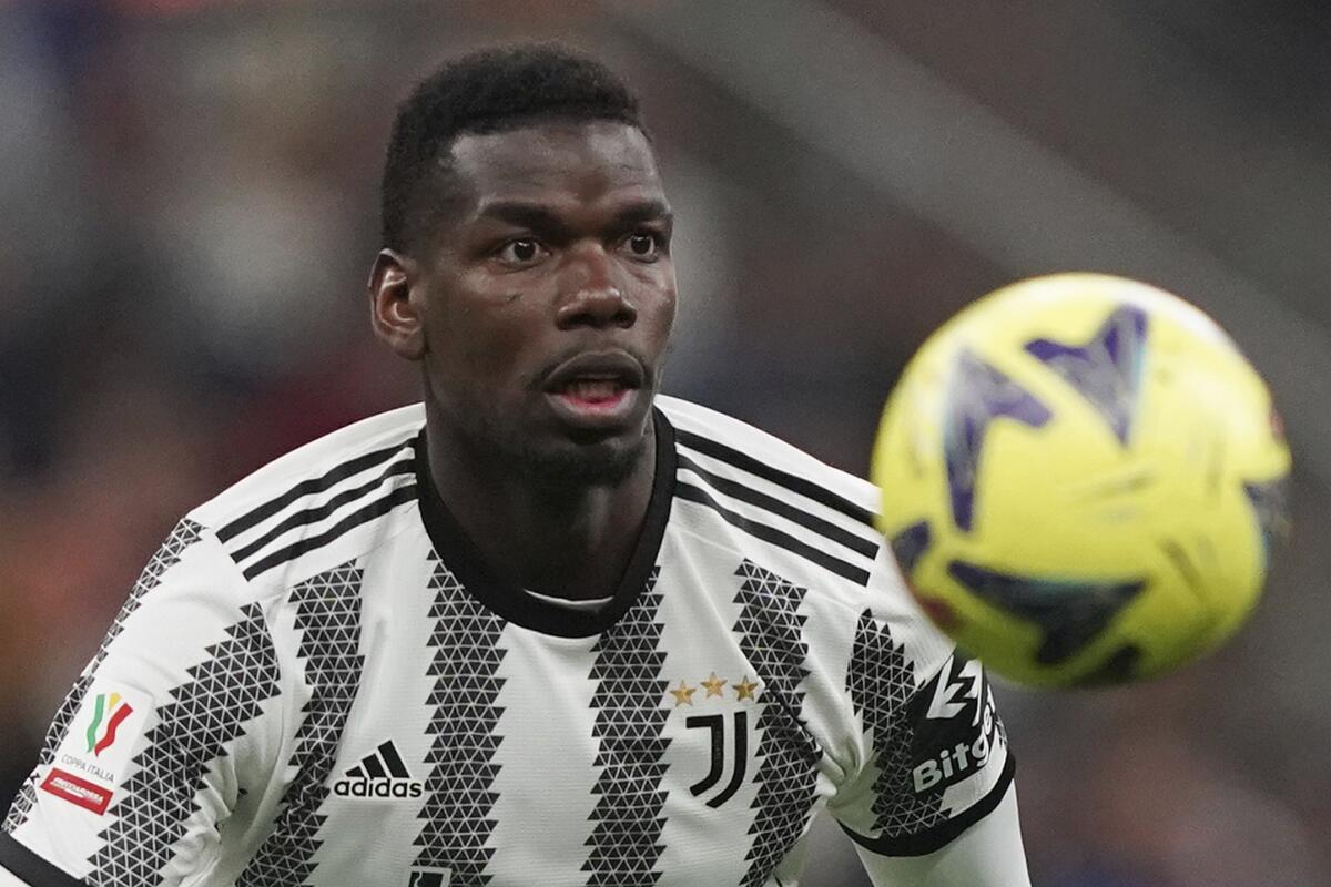 FILE - Juventus' Paul Pogba keeps his eyes on the ball during an Italian Cup soccer match between Inter Milan and Juventus, at the San Siro Stadium, in Milan, Italy, April 26, 2023. Juventus midfielder Paul Pogba has been banned for four years by Italy’s anti-doping court after the World Cup winner tested positive for testosterone. Pogba’s positive test was announced in September following an exam the previous month. (Spada/LaPresse via AP, File)