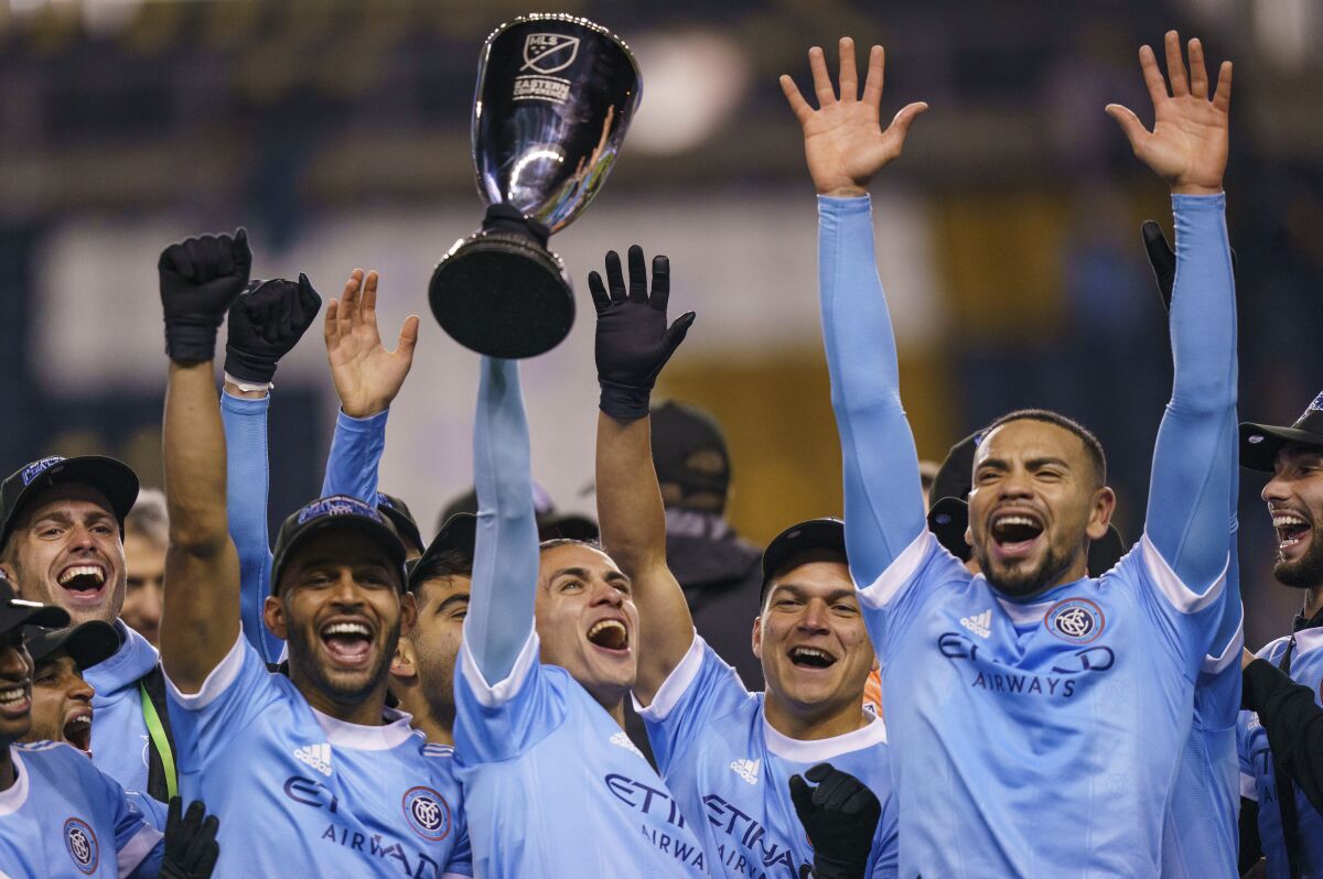 New York City FC celebrates winning the Eastern Conference Championship following an MLS playoff soccer match against the Philadelphia Union, Sunday, Dec. 5, 2021, in Chester, Pa. New York City FC won 2-1 and clinches the MLS Eastern Conference Championship. (AP Photo/Chris Szagola)