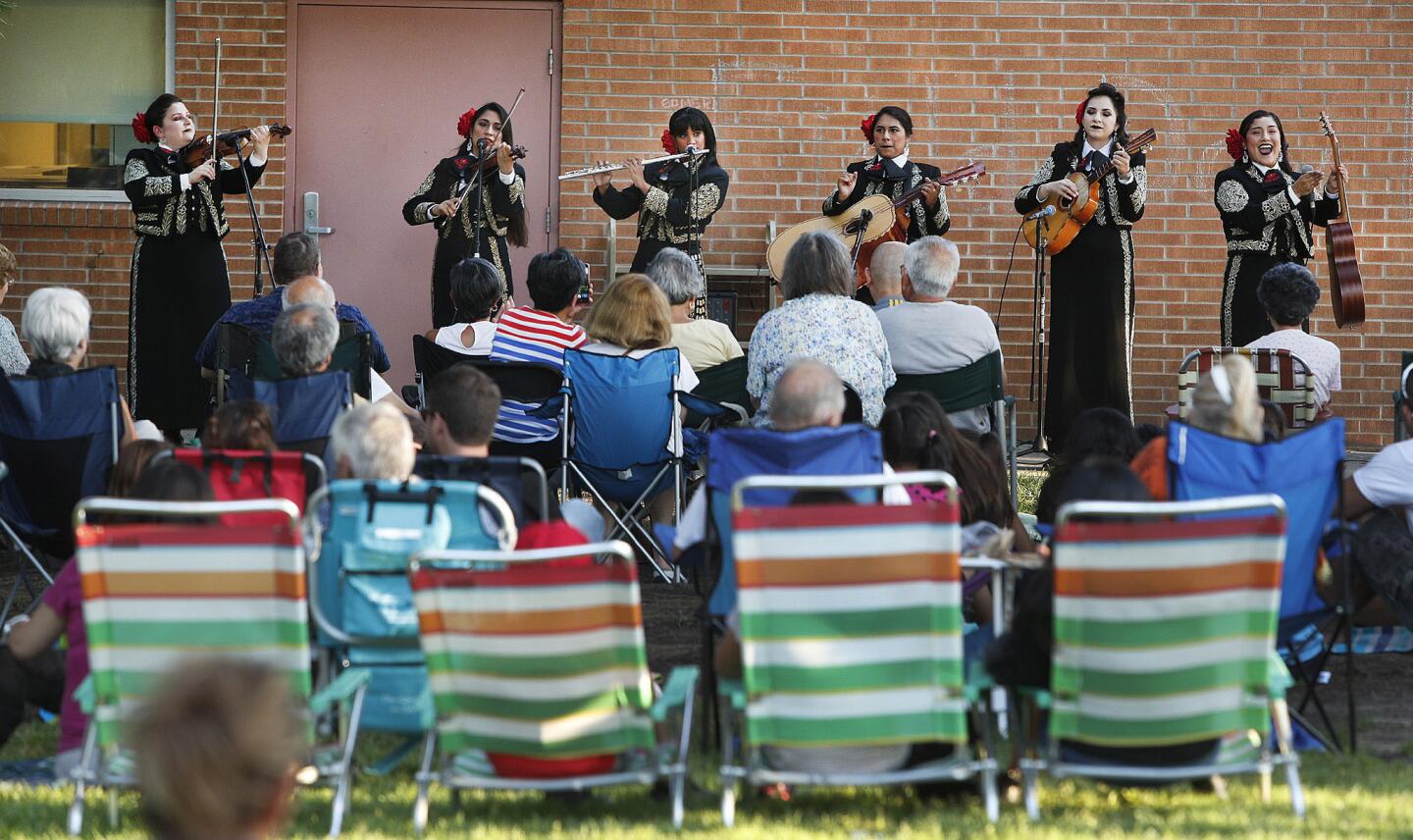 The Mariachi Divas de Cindy Shea perform for the last summer concert of the season at the Northwest Branch Library in Burbank on Wednesday, August 1, 2018. The Grammy Award-winning performers are a multi-cultural, all female ensemble imbued with the unique musical flavor of Los Angeles.