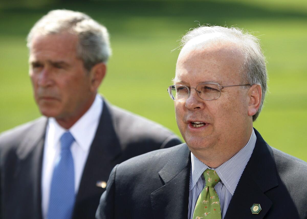 Master of social welfare: Karl Rove (R), seen here with his protege President George W. Bush in 2007. Rove's political campaign group recently earned a tax exemption from the IRS.