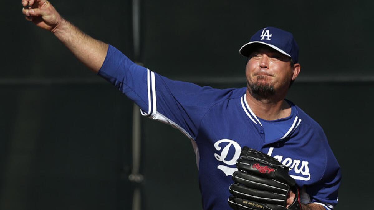 This time Josh Beckett is drilled in Dodgers' 8-5 loss to Mariners