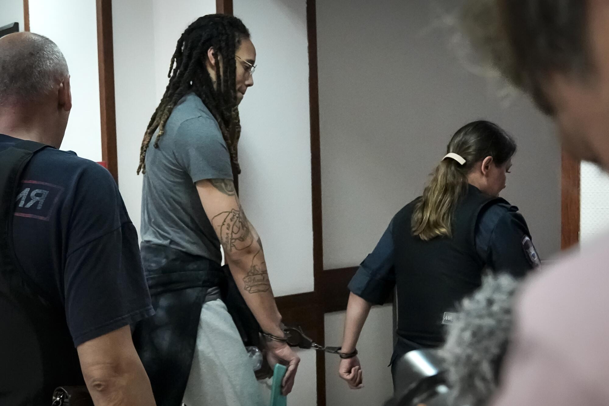 Griner leaves a courtroom after a hearing, in Khimki just outside Moscow, Russia, Monday, June 27, 2022.