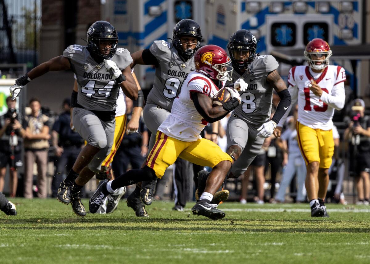 USC running back MarShawn Lloyd carries the ball against Colorado in the Trojans' win over the Buffaloes on Sept. 30.
