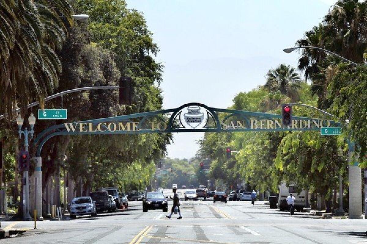 A welcome sign on 6th Street greets visitors to San Bernardino. The city recently filed for Chapter 9 bankruptcy protection, making it the third California city to do so this summer.