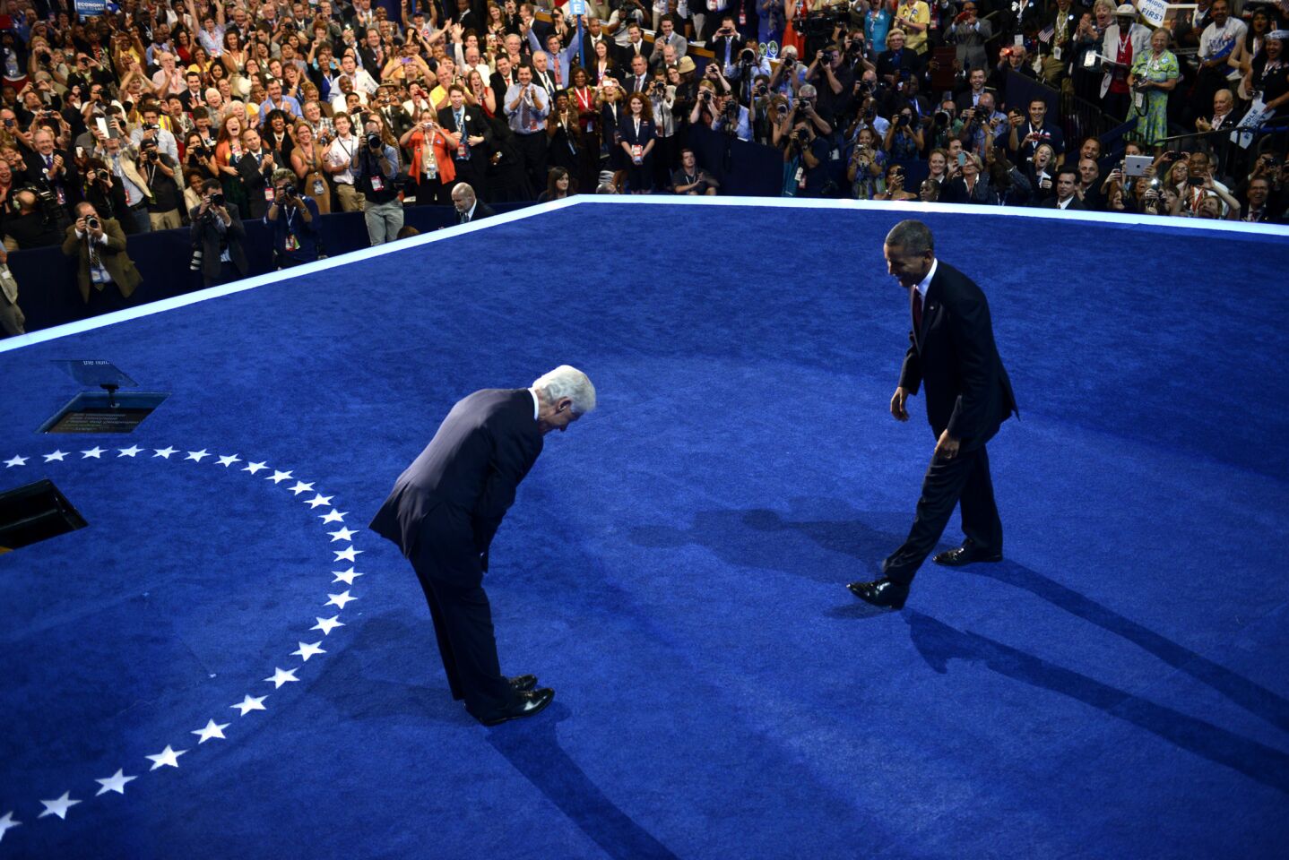 The 42nd President of the U.S., Bill Clinton bows to the 44th President of the U.S. Barack Obama in Charlotte, N.C. on the second day of the Democratic National Convention.