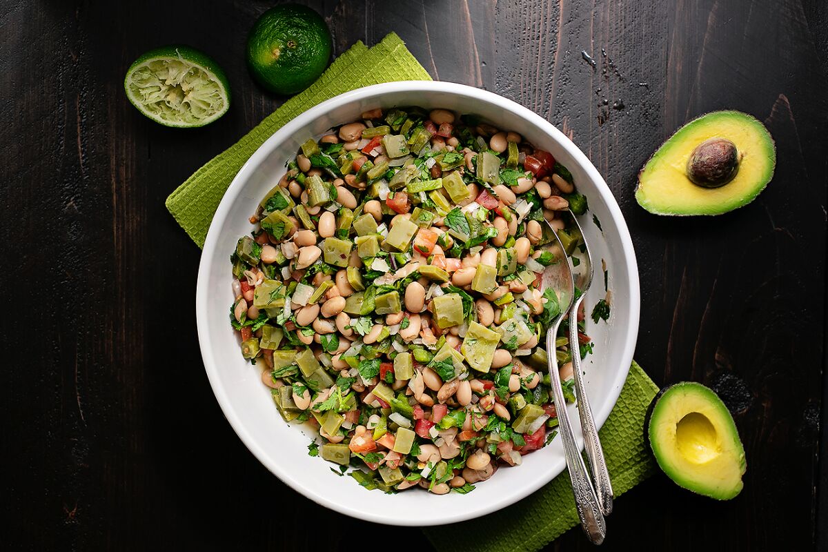 Cactus salad with beans is a light and nutritious vegetarian meal on a warm summer evening.