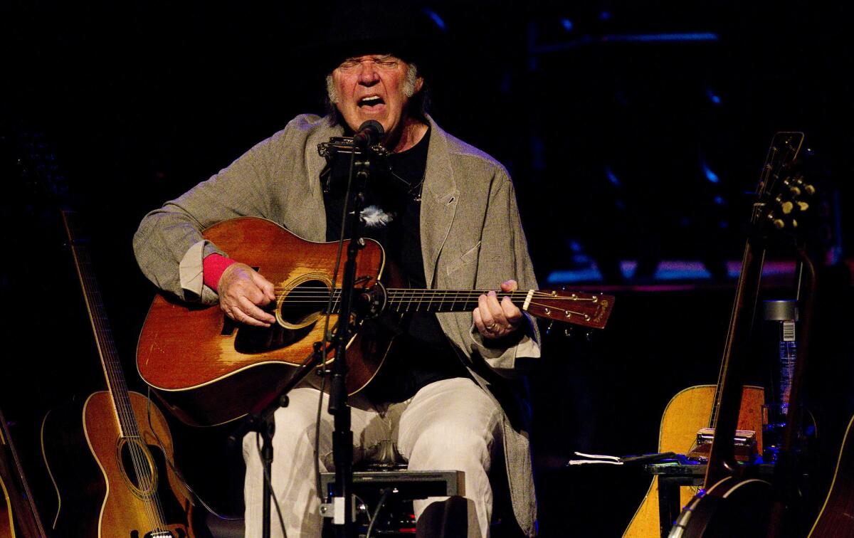 Neil Young, shown during a solo show in March in Hollywood, is appearing on "The Tonight Show."