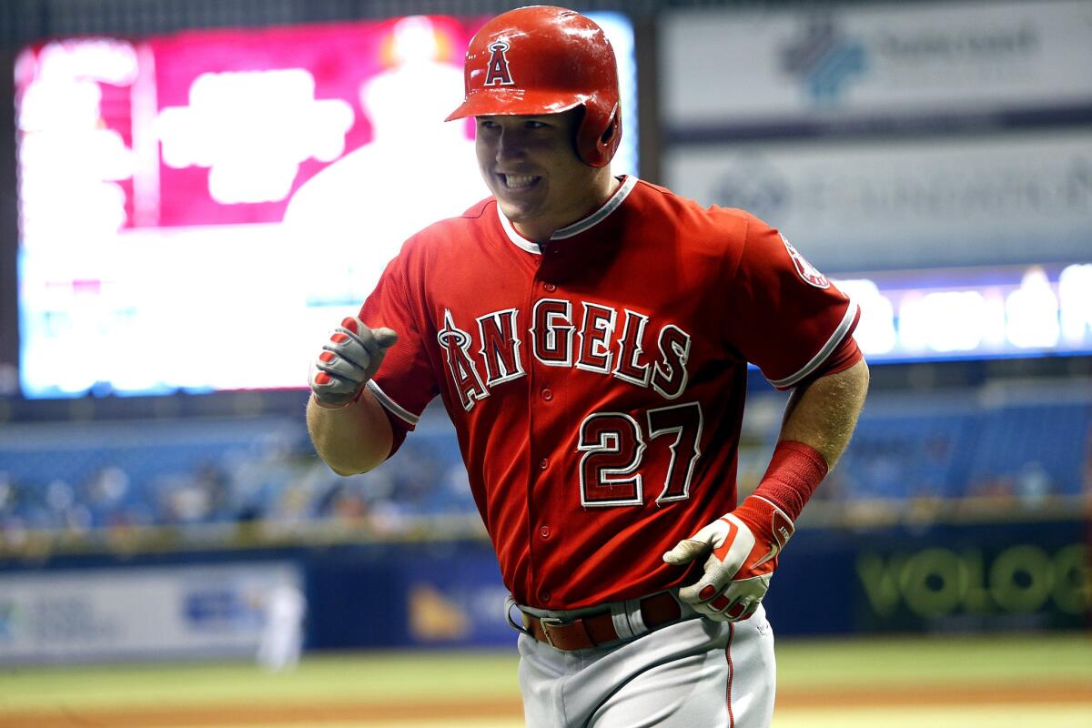 Angels outfielder Mike Trout smiles after hitting a two-run home run in the sixth inning against the Rays.
