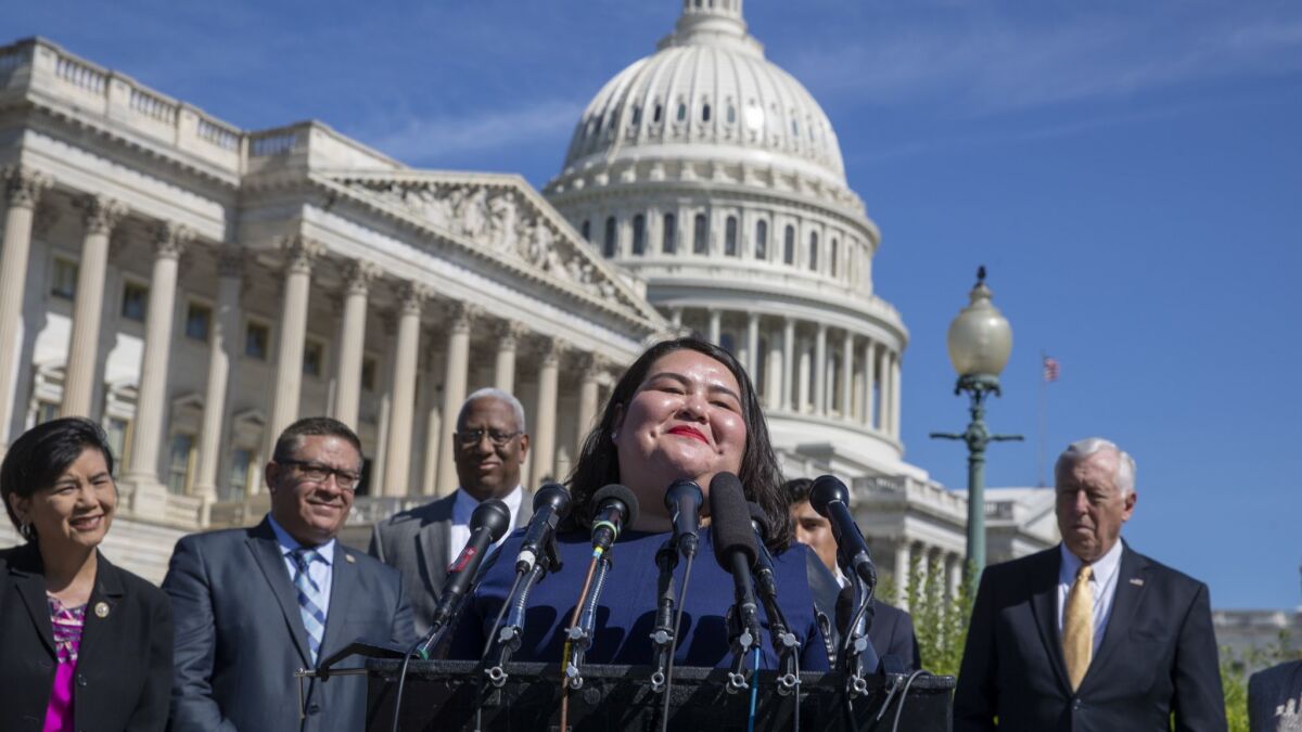 Greisa Martinez, a DACA recipient and advocacy director of United We Dream, joins lawmakers and supporters of "Dreamers" in Washington on June 15, 2018.