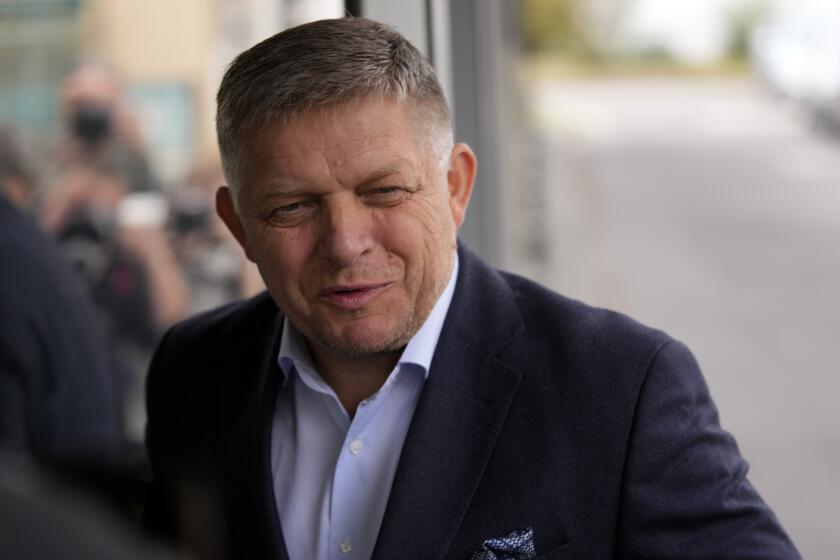 Chairman of SMER-Social Democracy party Robert Fico arrives at his party's headquarters day after an early parliamentary election in Bratislava, Slovakia, Sunday, Oct. 1, 2023. (AP Photo/Darko Bandic)