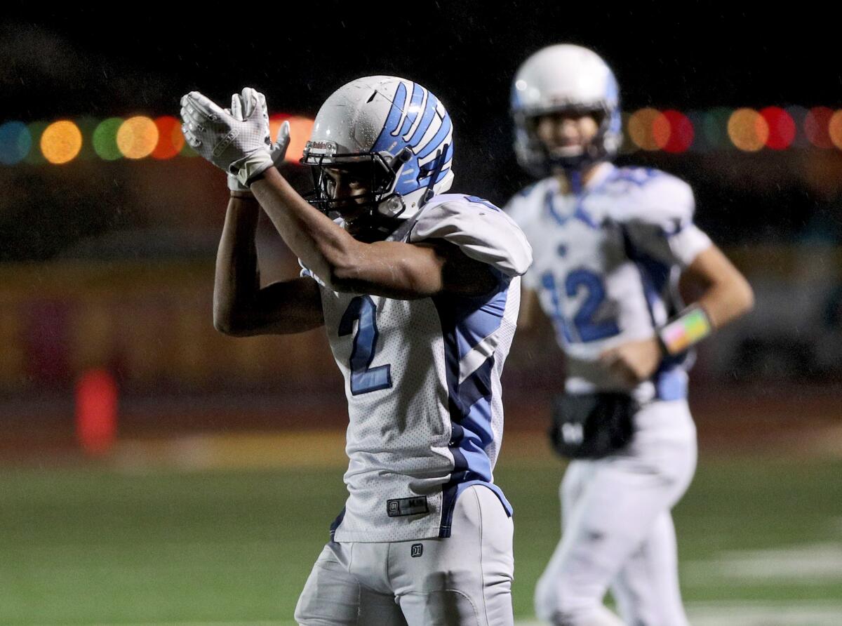 Crescenta Valley RB/DB Maximus Grant cheers a TD in the second quarter of play in the CIF SS Div. X championship game vs. Simi Valley High, at SMHS in Simi Valley on Saturday, Nov. 29, 2019.