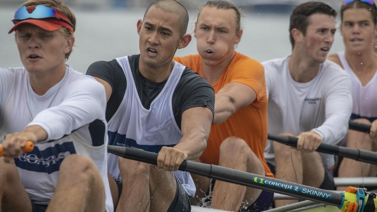 From left, Orange Coast College rowers Caleb O'Neil, Daniel Amado, Axel Witt, Ken Ponchak and Cole Guild practice.